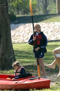 kayak and pfd on land